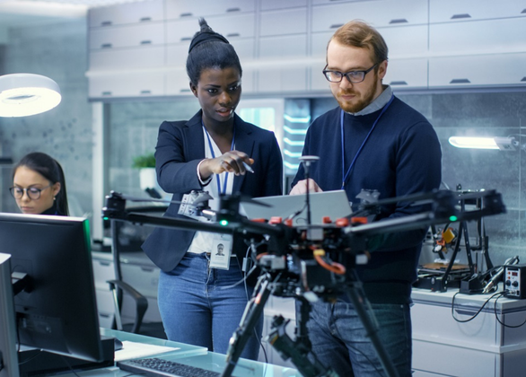 Female and male engineer working on a project