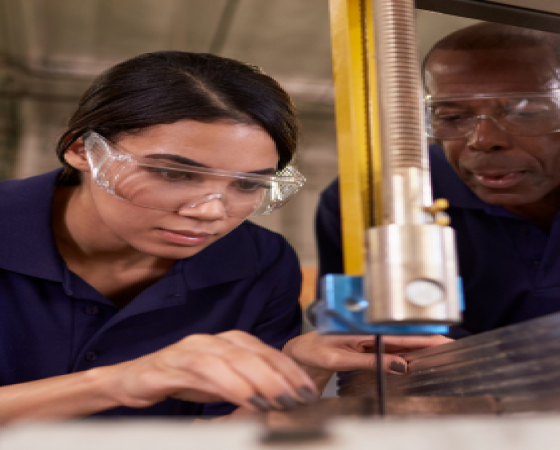 Young woman doing woodwork, Young Apprentice