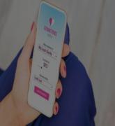 Woman donating money by using phone