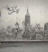 boy on ladder drawing airplane on skyline
