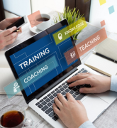 Training, knowledge, coaching, and teaching concepts on laptop